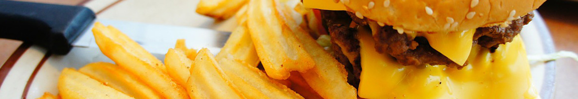 Eating Burger at Old Fashioned Burgers & Ice Cream restaurant in Salado, TX.